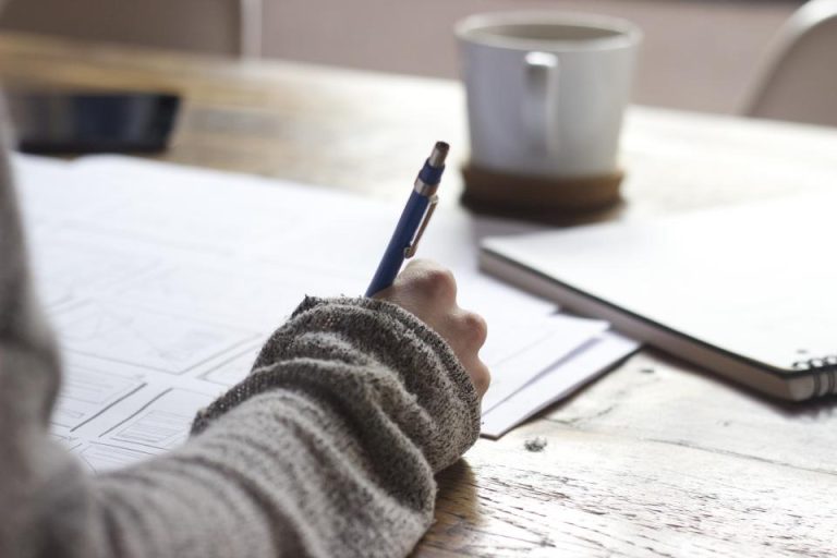An open notebook and pen